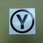 SIGN DC SYMBOL CIRCLE YOKE BLACK (Y) 4" SQ.