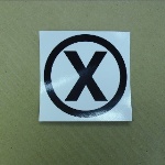 SIGN DC SYMBOL CIRCLE XRAY BLACK "(X)" 4" SQ.